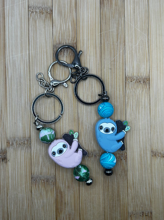 His and hers sloth keychains